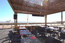 Pita Corner Canet-Plage • restaurant grec avec des tables en terrasse vue mer ( ®SAAM-evan PETITFILS)